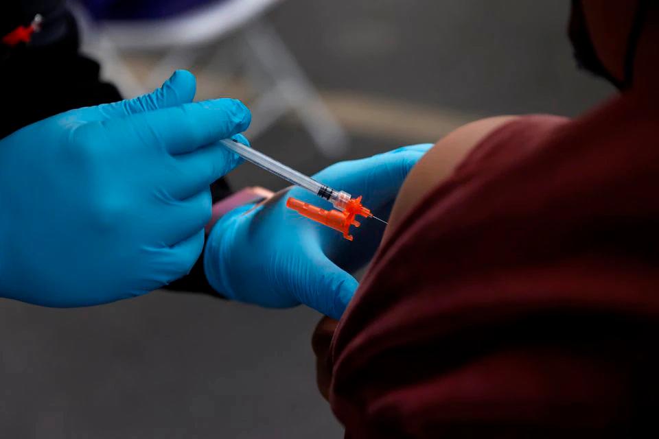 US appeals court will not block order barring federal staff vaccine mandate