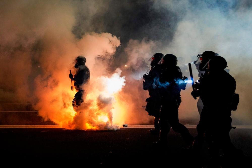US mayor of Portland bans the use of tear gas by police US mayor of Portland bans the use of tear gas by police