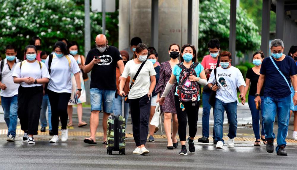 Vaccination remains Singapore primary line of defence in living with Covid-19: MOH