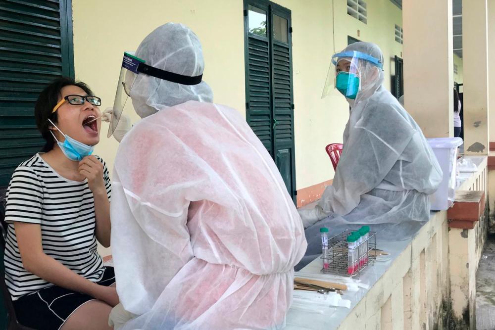Vietnam warns of hospitals strain as Covid-19 cases spike after holiday