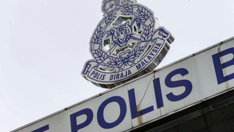 Woman, among 11 people detained after manâs body found in room