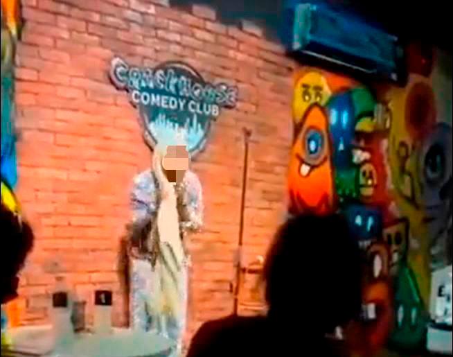 Woman who stripped down at comedy club to be charged with boyfriend (Updated)