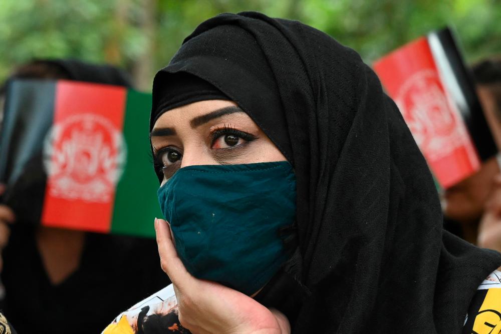 Women stage 'silent protest' in support of girls' education in Afghanistan Women stage 'silent protest' in support of girls' education in Afghanistan