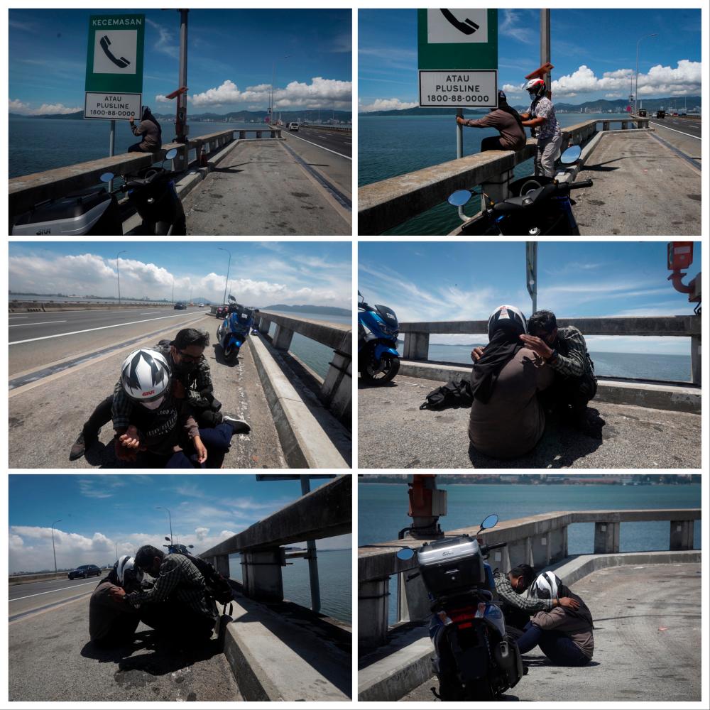 theSun, The Star photographers foil women’s suicide bid on Penang bridge theSun, The Star photographers foil women’s suicide bid on Penang bridge