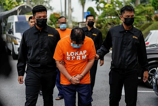 SG03_22042026_MENYELEWENG_ZAKAT Two remanded over RM230 million zakat fund misappropriation