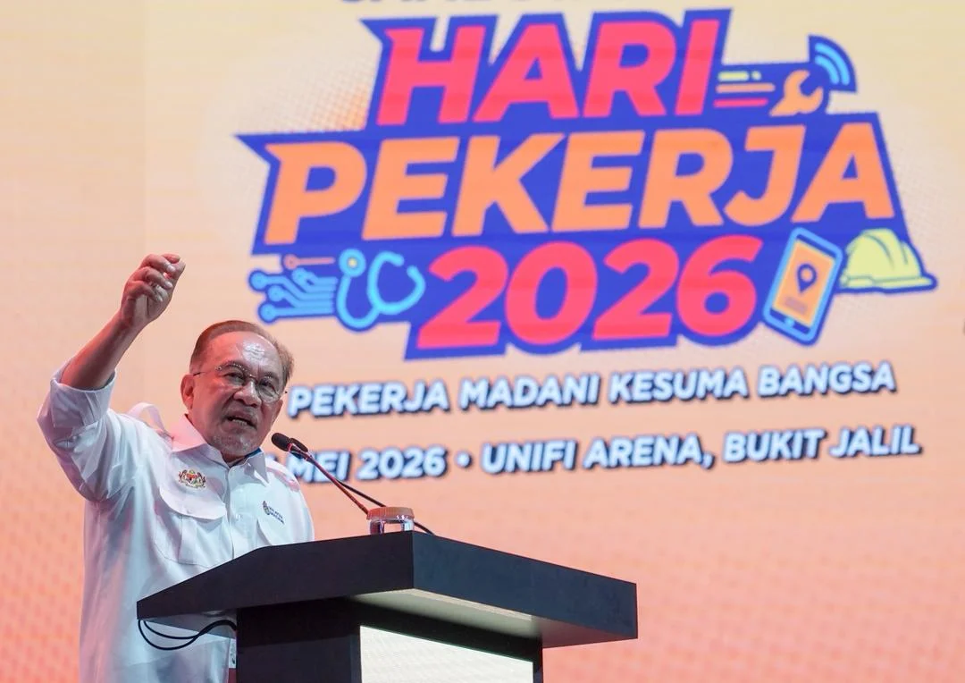 Anwar calls on top companies to raise wages, safeguard workers