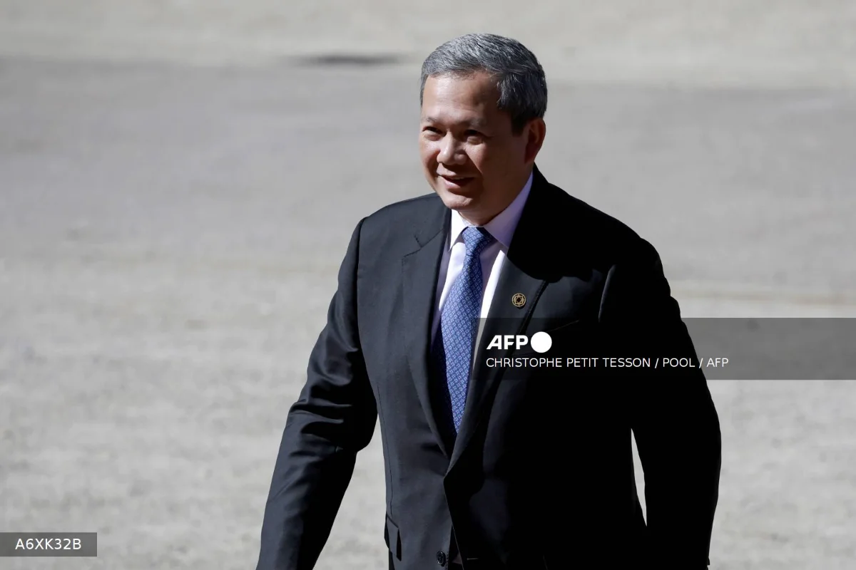 Cambodian PMs cousin admits 30 stake in scam-linked firm Cambodian PM's cousin admits 30% stake in scam-linked firm