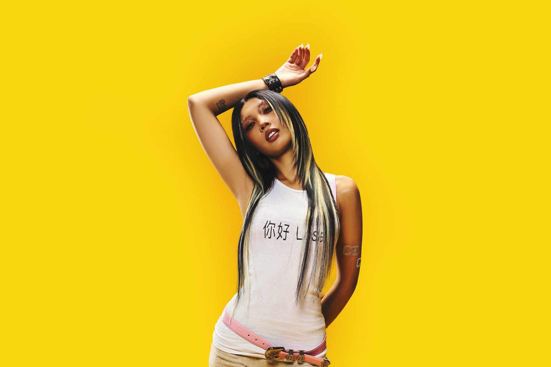 er work has crossed into K-pop and C-hip hop collaborations, while her 2026 activity has included viral covers of her single Hard to Say.