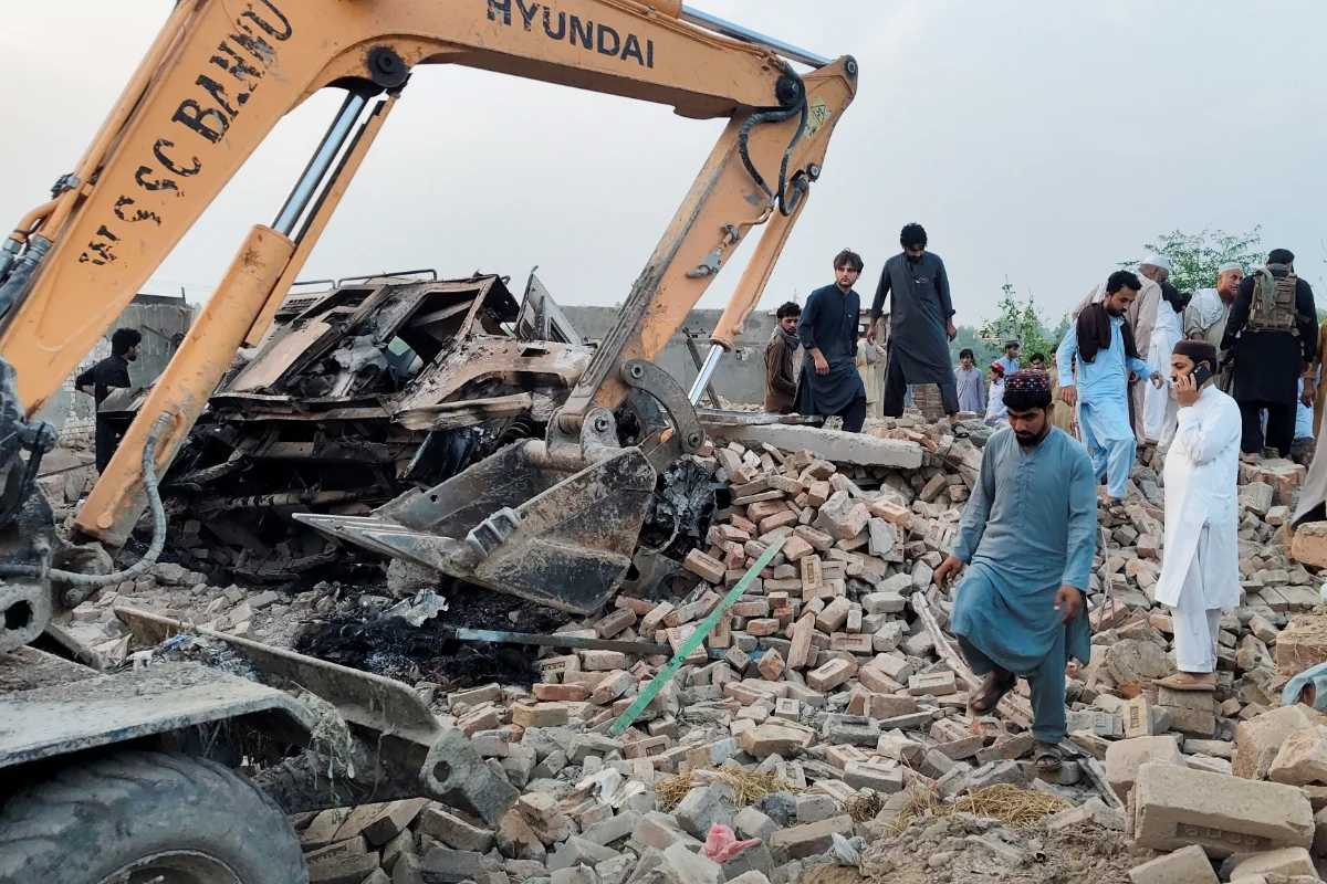 PAKISTAN-SECURITY Car bomb attack on checkpoint kills at least 12 in northwest Pakistan: police