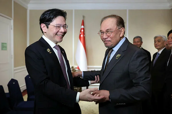 PHL31_07052026_PM_ASEAN Anwar holds bilateral talks with Singapore and Laos leaders