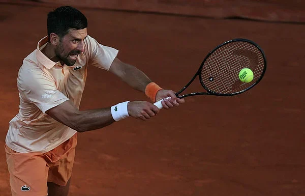 Djokovic fights through at French Open, Rybakina dumped out