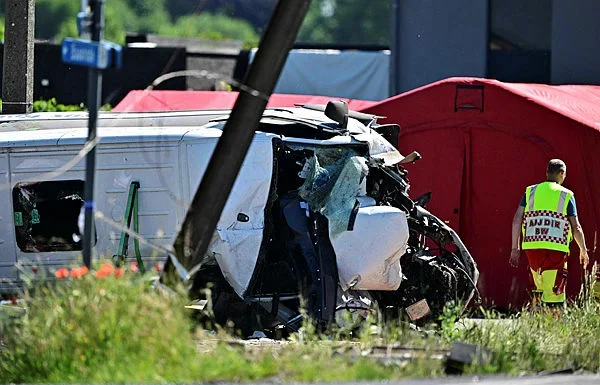 Four dead after train hits school bus in Belgium