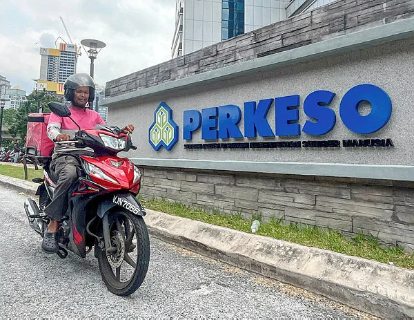 gig worker Son of ex-Perlis MB acquitted of false claim charge