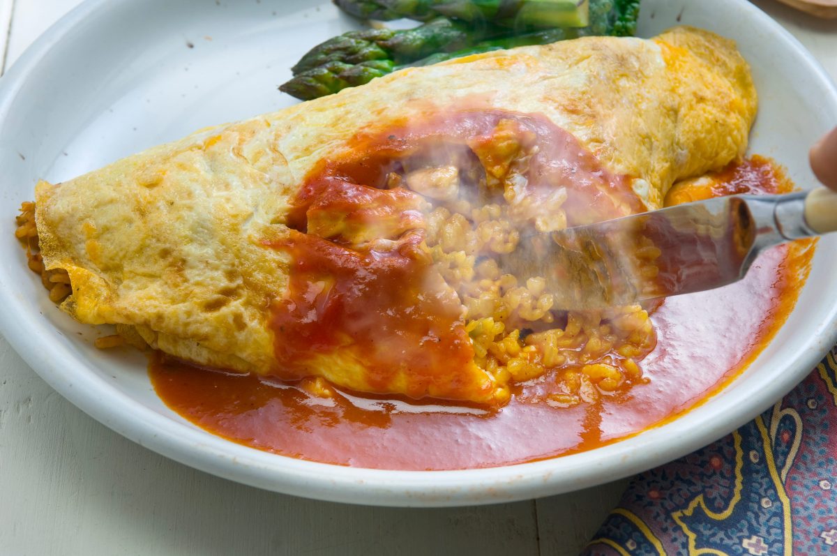 Omurice pairs fried rice with a soft omelette, bringing two textures into one dish.