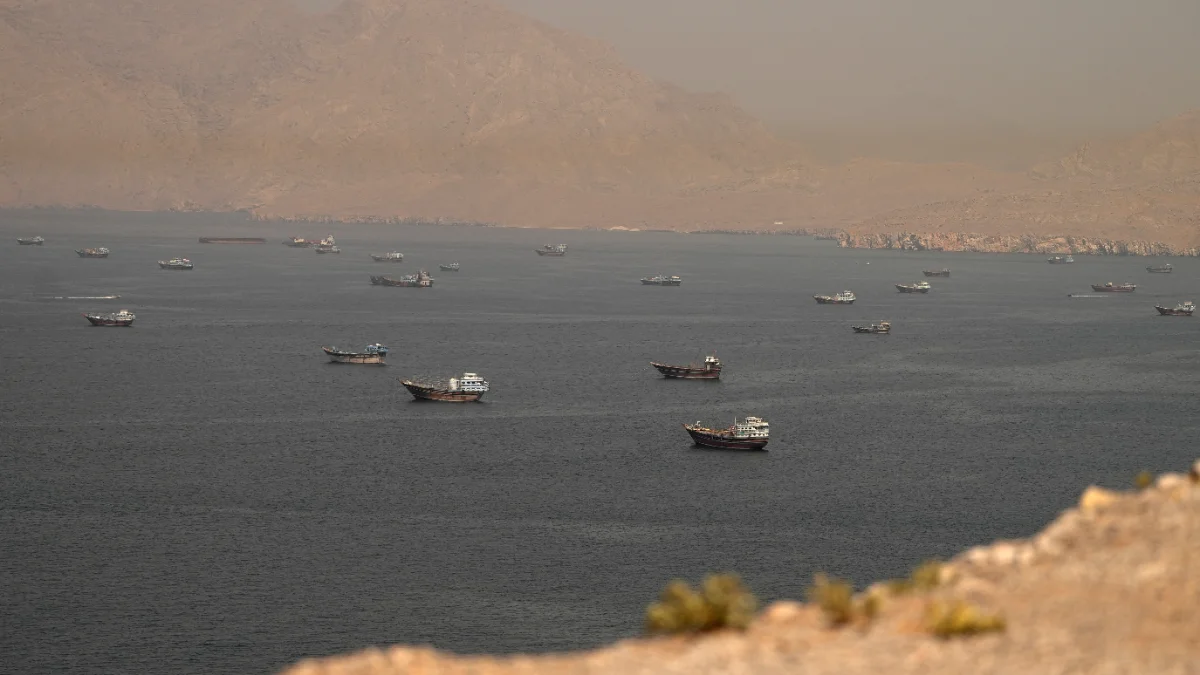 2026-0FILE PHOTO: Vessels at the Strait of Hormuz, as seen from Musandam, Oman, June 18, 2026. REUTERS/Stringer/File Photo/File Photo6-22T013425Z_1228575562_RC2AWLAU72EG_RTRMADP_3_GLOBAL-MARKETS