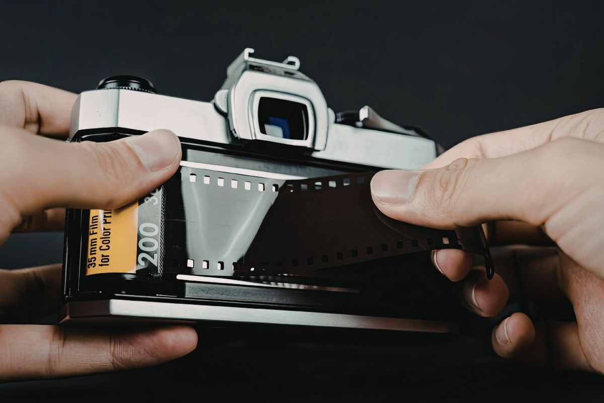 Loading 35mm film requires threading the film leader onto the take-up spool and advancing it two frames to ensure it is properly engaged before shooting. – PICS FROM 123RF