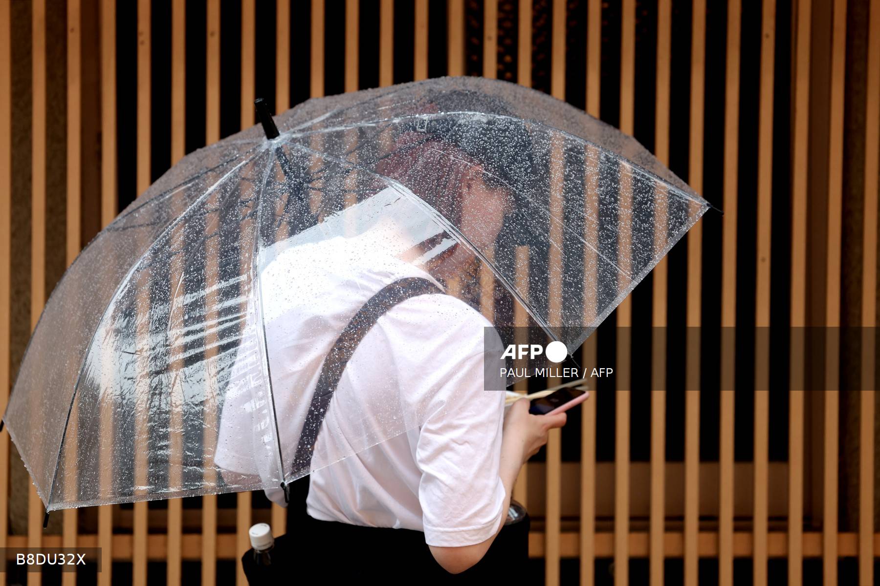 Japan cancels 120 flights as twin storms near