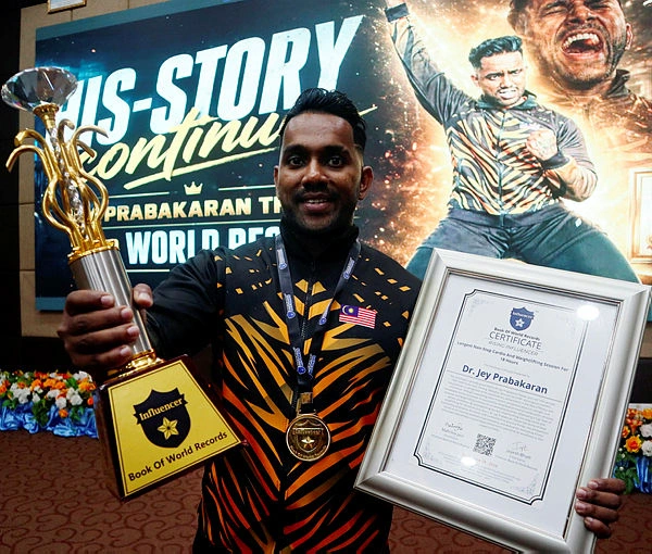 Dr Kjey dedicates third world record to his late father