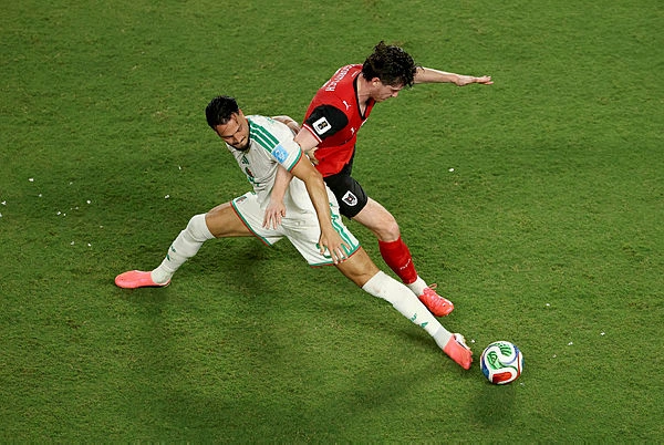 Algeria and Austria reach World Cup knockouts after 3-3 thriller
