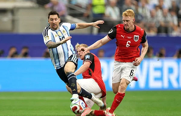 Magic Messi makes World Cup history to send Argentina into last 32