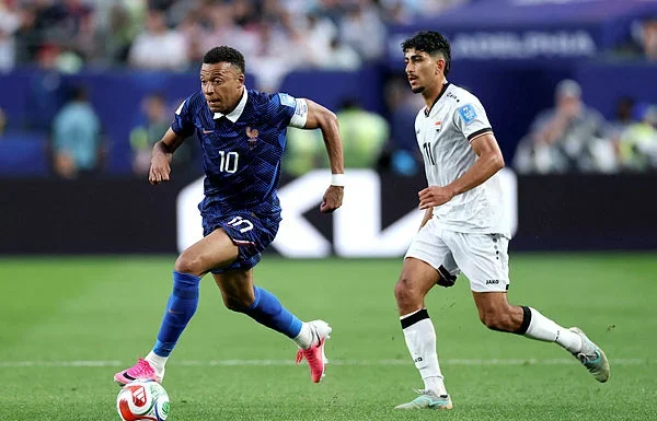 France-Iraq World Cup game restarts after two-hour storm delay