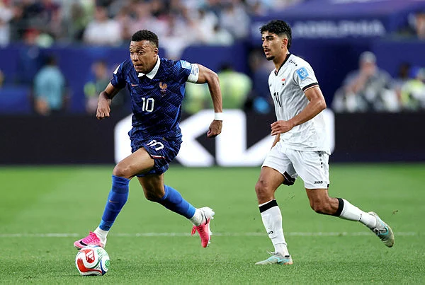 France-Iraq World Cup game restarts after two-hour storm delay