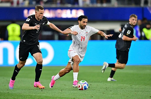 Iran battle to 2-2 draw with New Zealand in World Cup opener Iran battle to 2-2 draw with New Zealand in World Cup opener