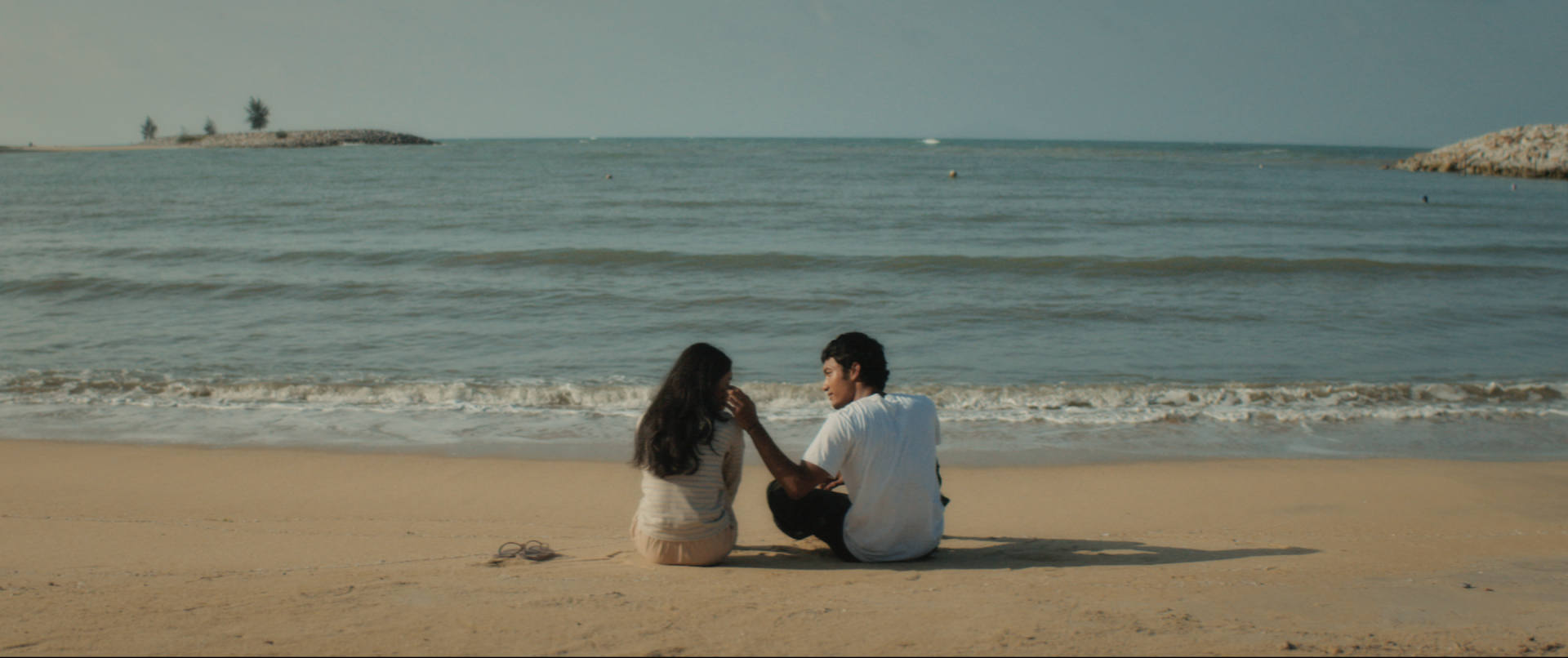 Jani and Melur cling to fleeting moments of normalcy where dreams of a future together feel within reach, even as reality begins to close in around them. — HANDOUT PICS