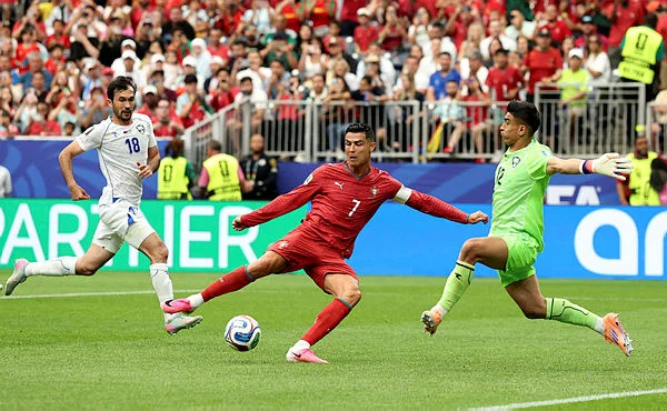 Ronaldo scores twice as Portugal hit five to reach brink of last 32