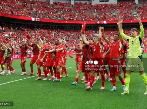 Switzerland down World Cup co-hosts Canada to top Group B, both progress
