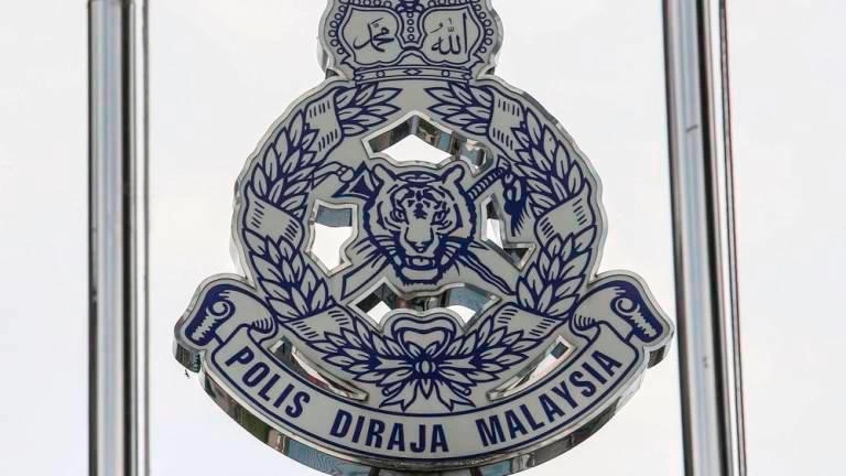 Two men arrested with heroin after car chase on Jalan Kuching