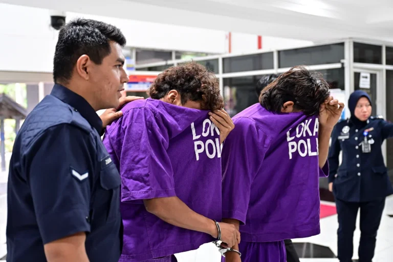 Two men remanded over alleged assault on foreign national
