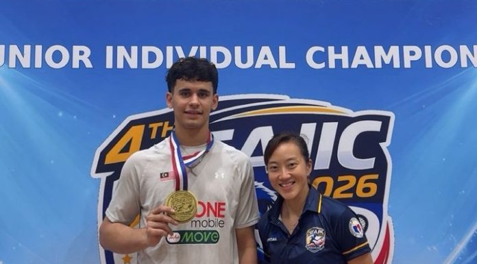 Negaraku echoes through Manila as Erwin secures historic championship defense