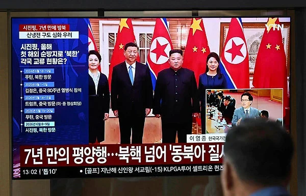 China's Xi in North Korea for rare visit