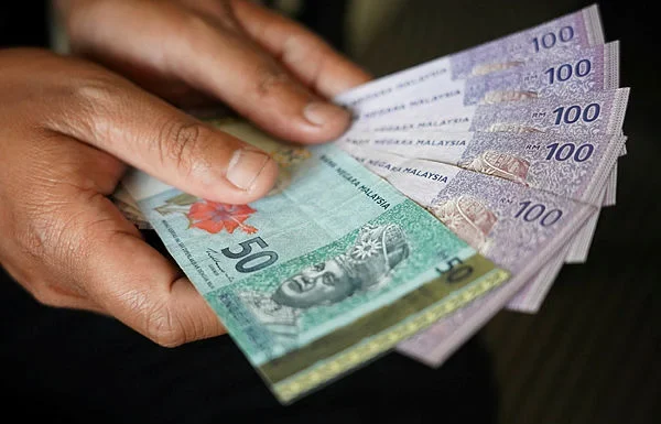Ringgit opens softer against US dollar ahead of key PCE inflation report due Thursday