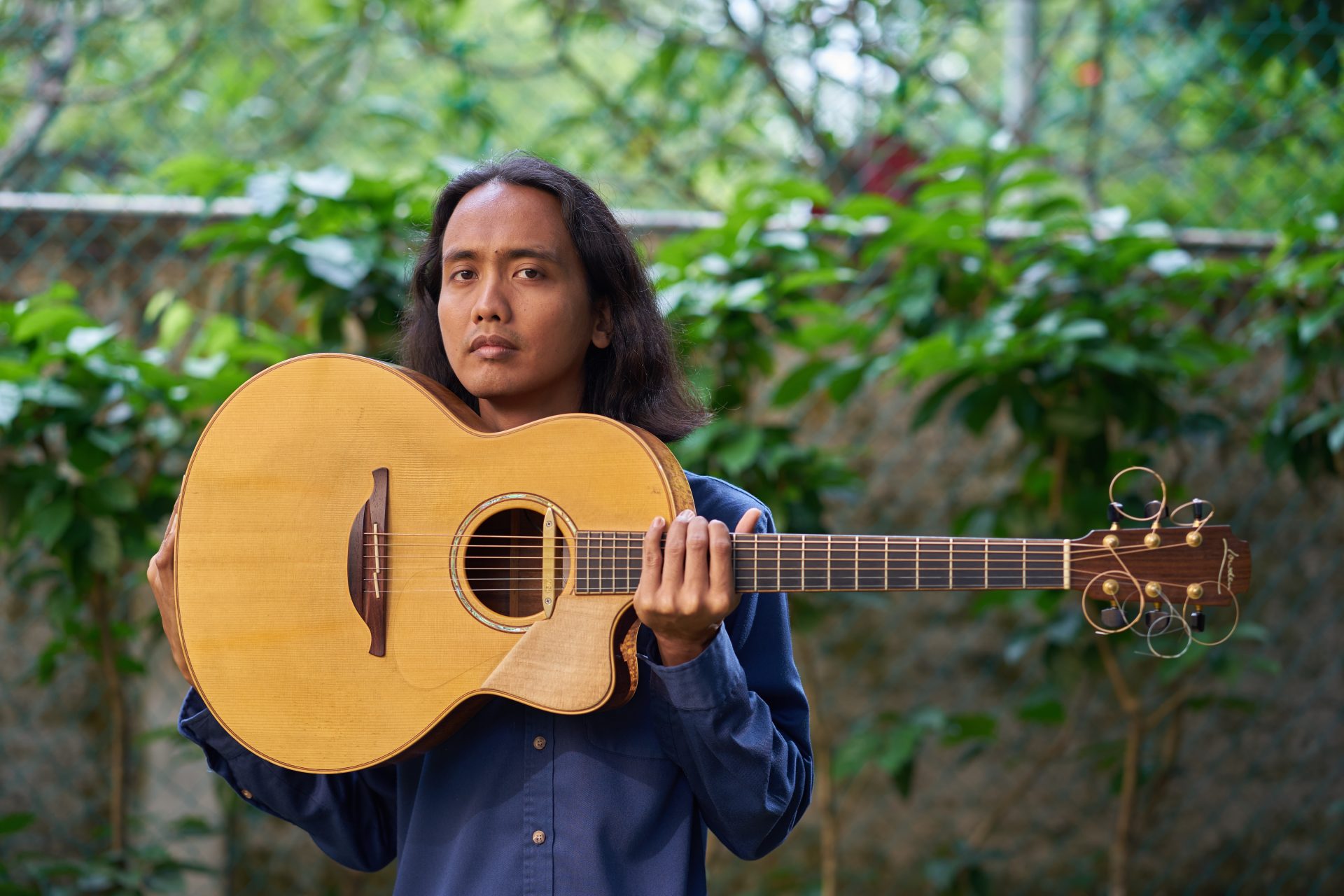 Az Solo DSC00075 Please Credit Photo by Kok Keong Tang A Berklee College of Music alumnus, Az has worked as a guitarist, composer and educator for nearly three decades.