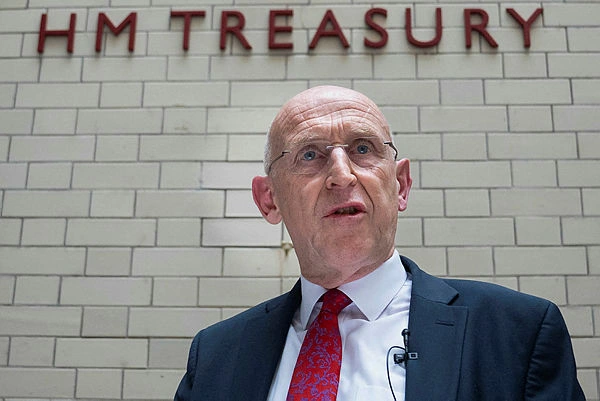 BRITAIN-GOVERNMENT-FINANCE- UK inflation falls more than expected to 2.6% in June