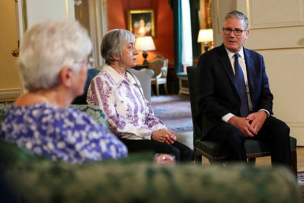 BRITAIN-POLITICS (3) UK PM 'deeply sorry' for decades of forced adoptions