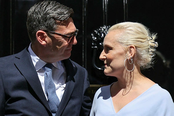 BRITAIN-POLITICS (4) 'Coolest girl': UK PM Burnham's wife Marie-France van Heel