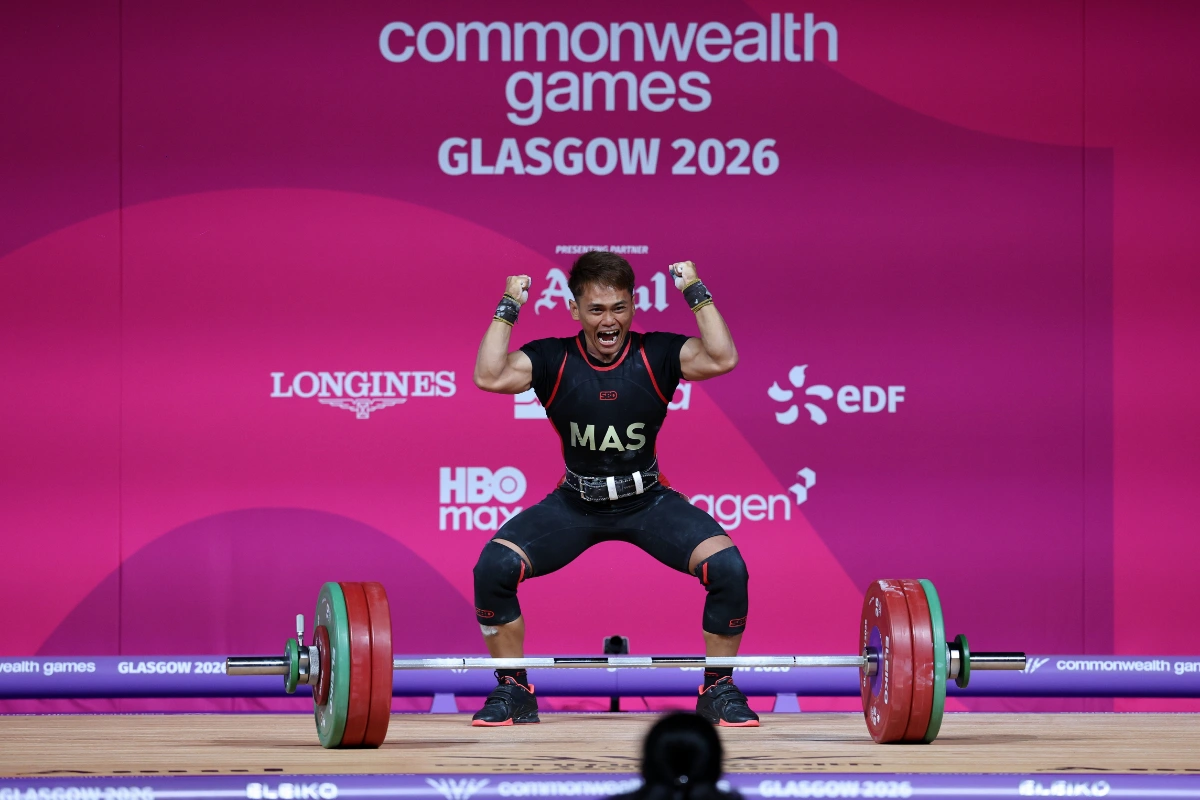 COM09_26072026_ANGKAT_BERAT Cramps fail to stop Mohamad Aniq from winning first Glasgow gold