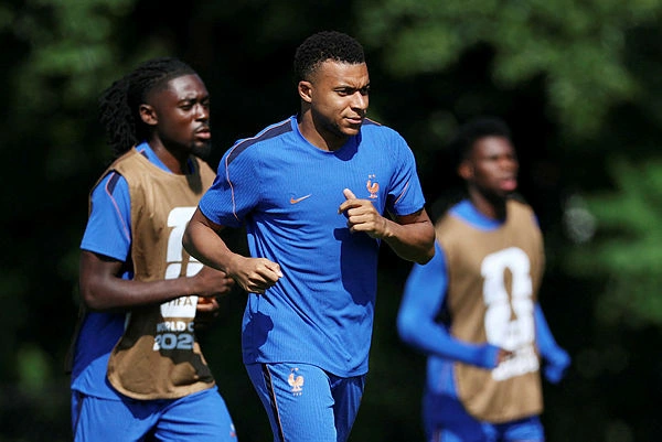 France urges calm during World Cup game against Morocco