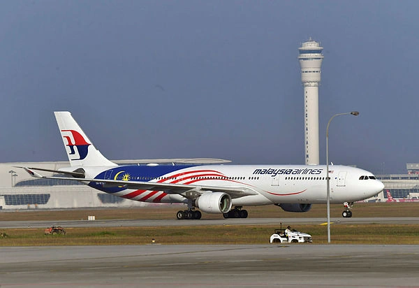 Malaysia Airlines cancels more flights as Typhoon Bavi nears Malaysia Airlines cancels more flights as Typhoon Bavi nears