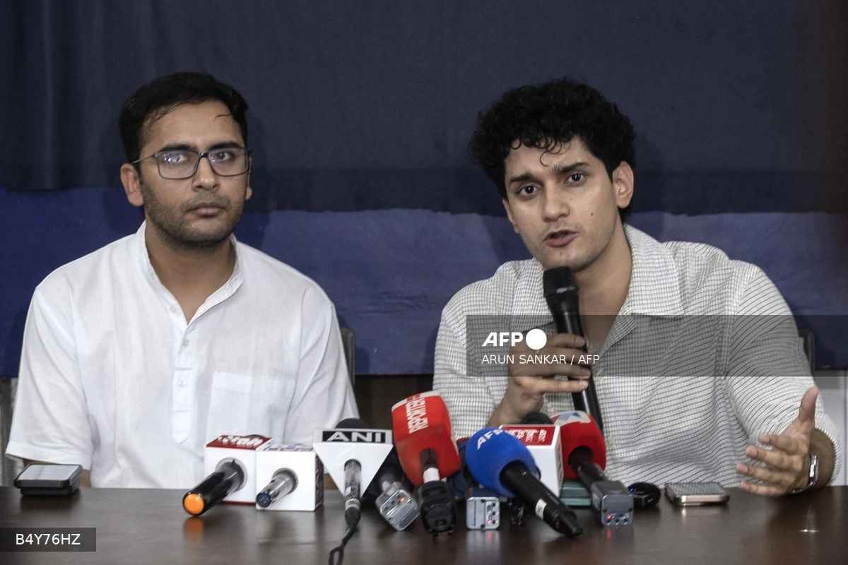Protesters vow to march on until Indias education minister resigns Protesters vow to march on until India's education minister resigns