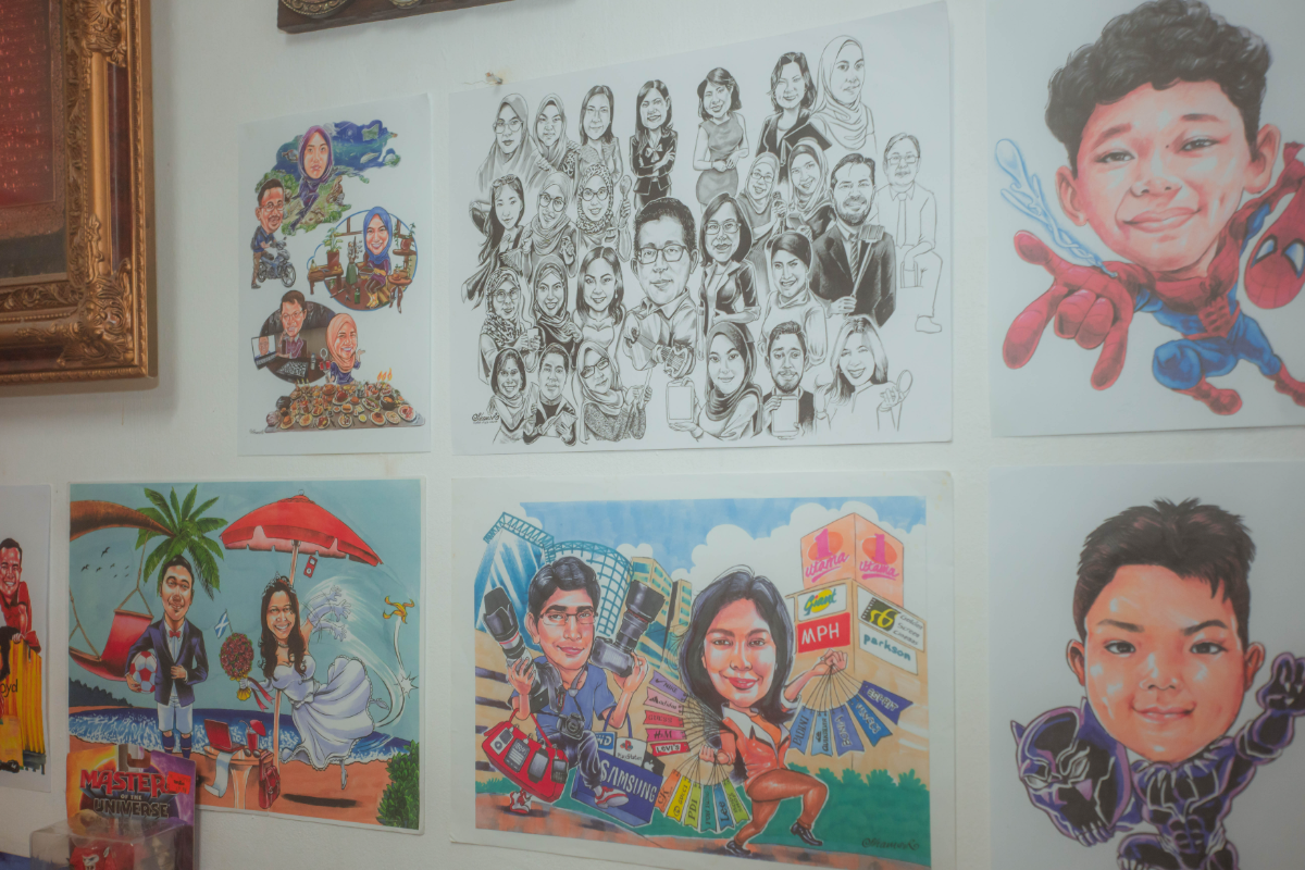 Meet the man of many colourful characters Working without pencil sketches, Syem draws caricatures directly in pen, relying on years of experience to capture a subject’s defining features.