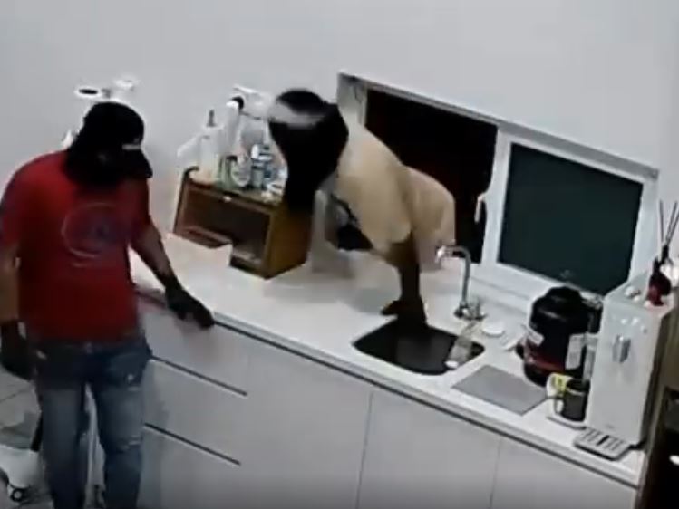 robbery 1 Three masked men caught on CCTV squeezing through kitchen window during Muar house break-in