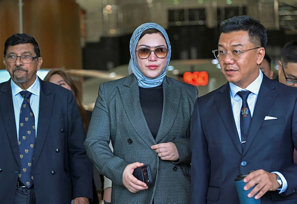 zizie Zizie Izette acquitted of all corruption abetment charges involving RM2.8million